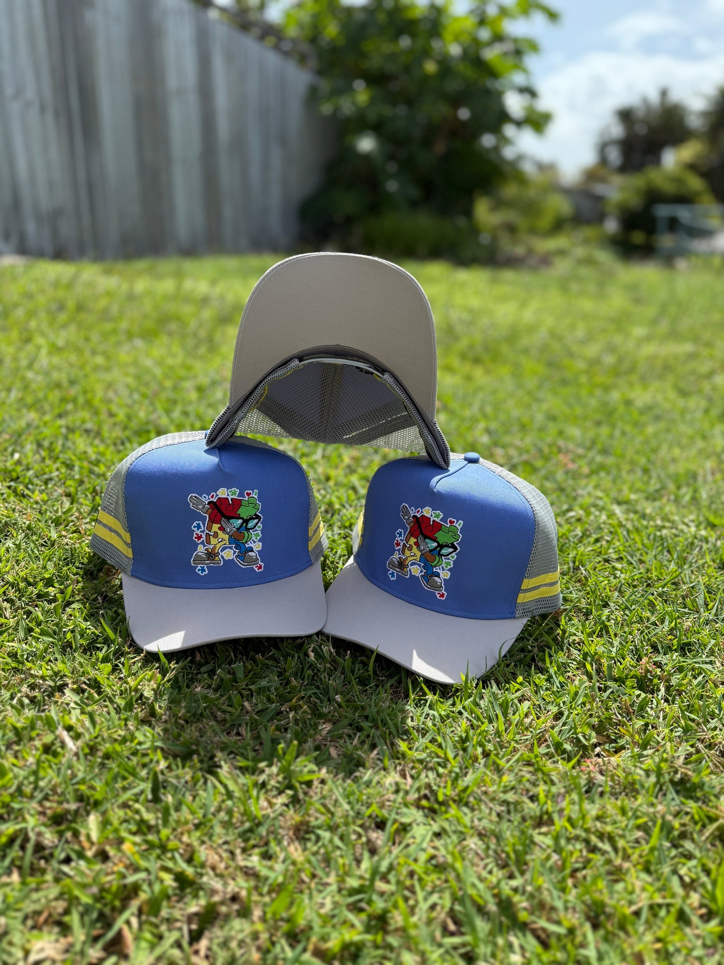 Puzzle Piece Racing Autism Awareness Trucker Hat
